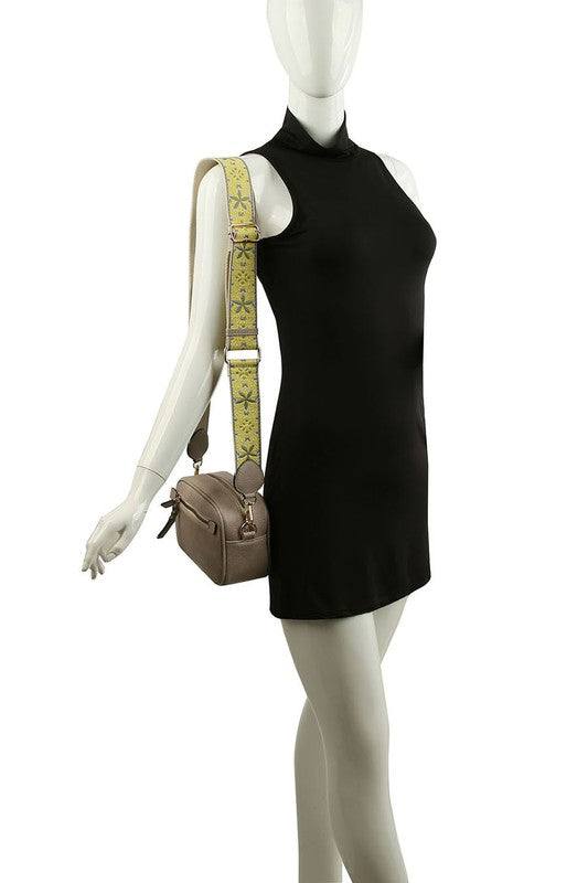 Fashion Guitar strap Crossbody BagFashion Guitar strap Crossbody Bag Faux vegan leather Zip top closure Gold-tone hardware Detachable shoulder strap L 8.5 * H 5.5 * W 3