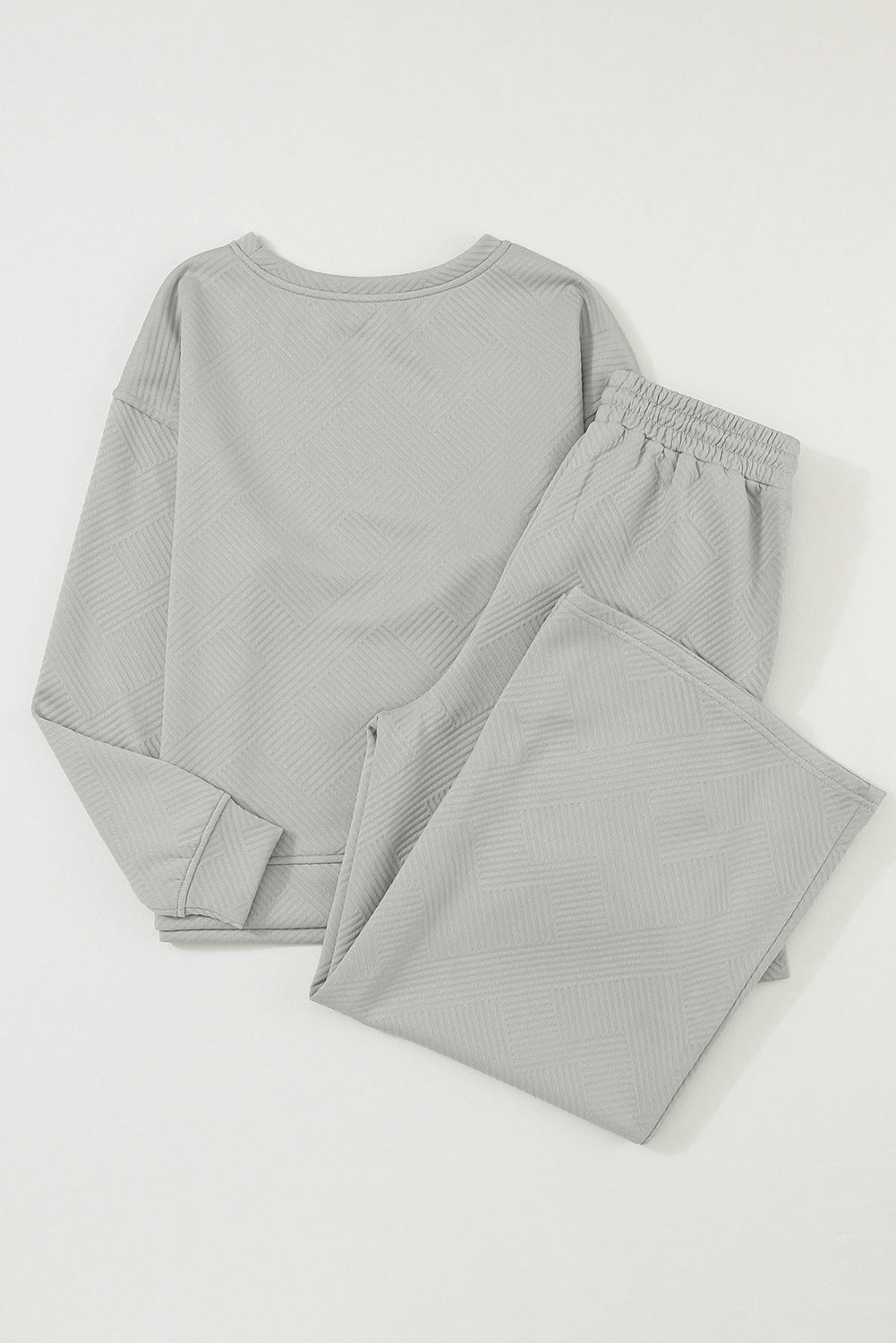 Red Dahlia Textured Loose Slouchy Long Sleeve Top and Pants SetMaterial:95%POLYESTER+5%ELASTANE



		Our Gray Textured Loose Slouchy Long Sleeve Top and Pants Set, a comfortable and stylish ensemble that is perfect for loungin