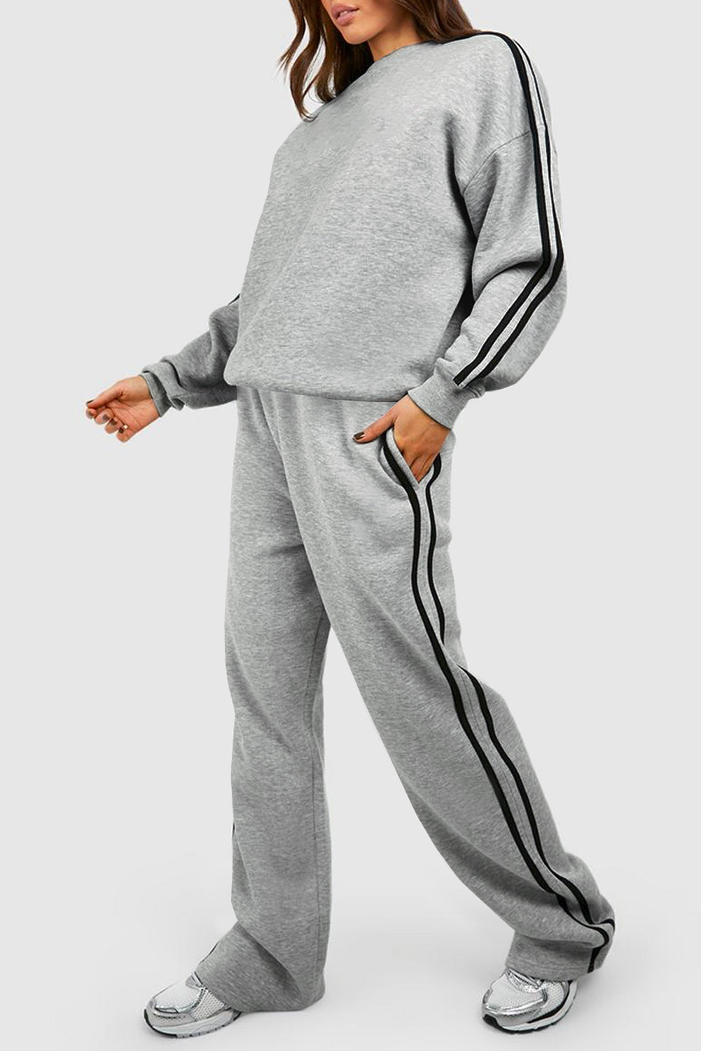 Light Grey Solid Color Side Striped Sweatshirt Pants SetMaterial:50%Polyester+50%Cotton

• This pants set exudes a modern appeal perfect for casual outings or lounging at home.
• Crafted from high-quality fabric for a s