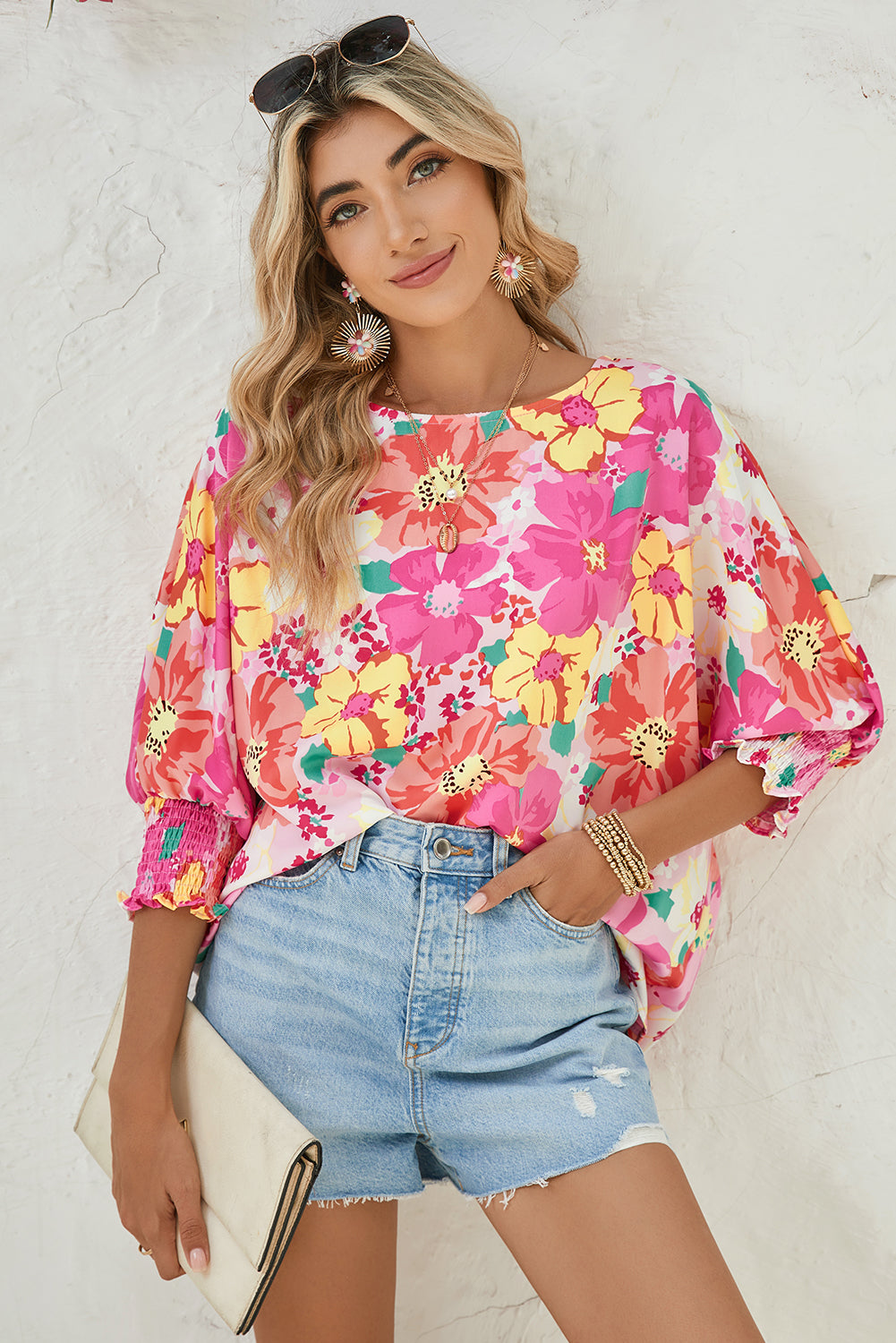 Pink Shirred Cuffs 3/4 Sleeve Boho Floral BlouseMaterial:100%Polyester



		The blouse is a stylish and feminine top featuring shirred cuffs and a boho-inspired floral print, adding a touch of bohemian charm to 
