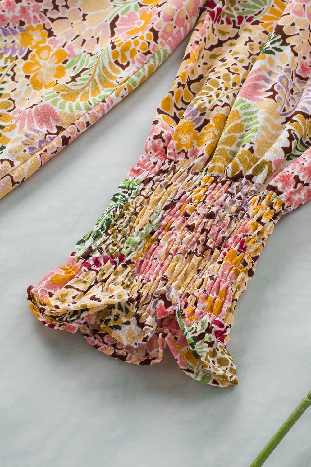 Multicolor Floral Print Smocked Cuffs Long Sleeve BlouseMaterial:100%Polyester


	

			The Floral Print Smocked Cuffs Long Sleeve Blouse is a feminine and elegant addition to any wardrobe. Its delicate floral print and