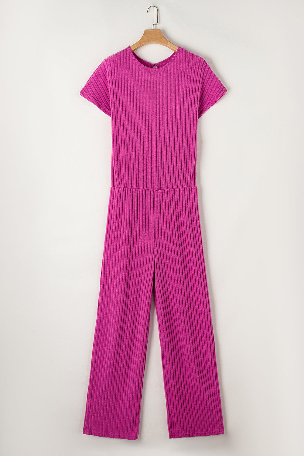 Grass Green Solid Color Ribbed Short Sleeve Wide Leg JumpsuitMaterial:85%Polyester+10%Viscose+5%Elastane



		The jumpsuit is a versatile and trendy one-piece outfit, featuring a solid color design that offers a sleek and mi
