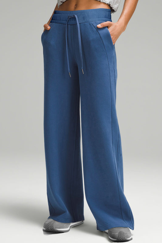 Sail Blue Drawstring High Waist Wide Leg Pocketed PantsMaterial:65%Polyester+35%Cotton

• Crafted from a luxurious sail blue fabric, these drawstring high waist pants offer a unique touch to your casual wardrobe.
• The