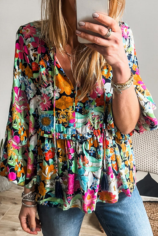 Multicolour Boho Floral V Neck Lantern Sleeve BlouseMaterial:100%Polyester

• Embrace boho-chic vibes with our blouse, featuring vibrant hues and a tie front design for a stylish look.
• The lantern sleeves add a to