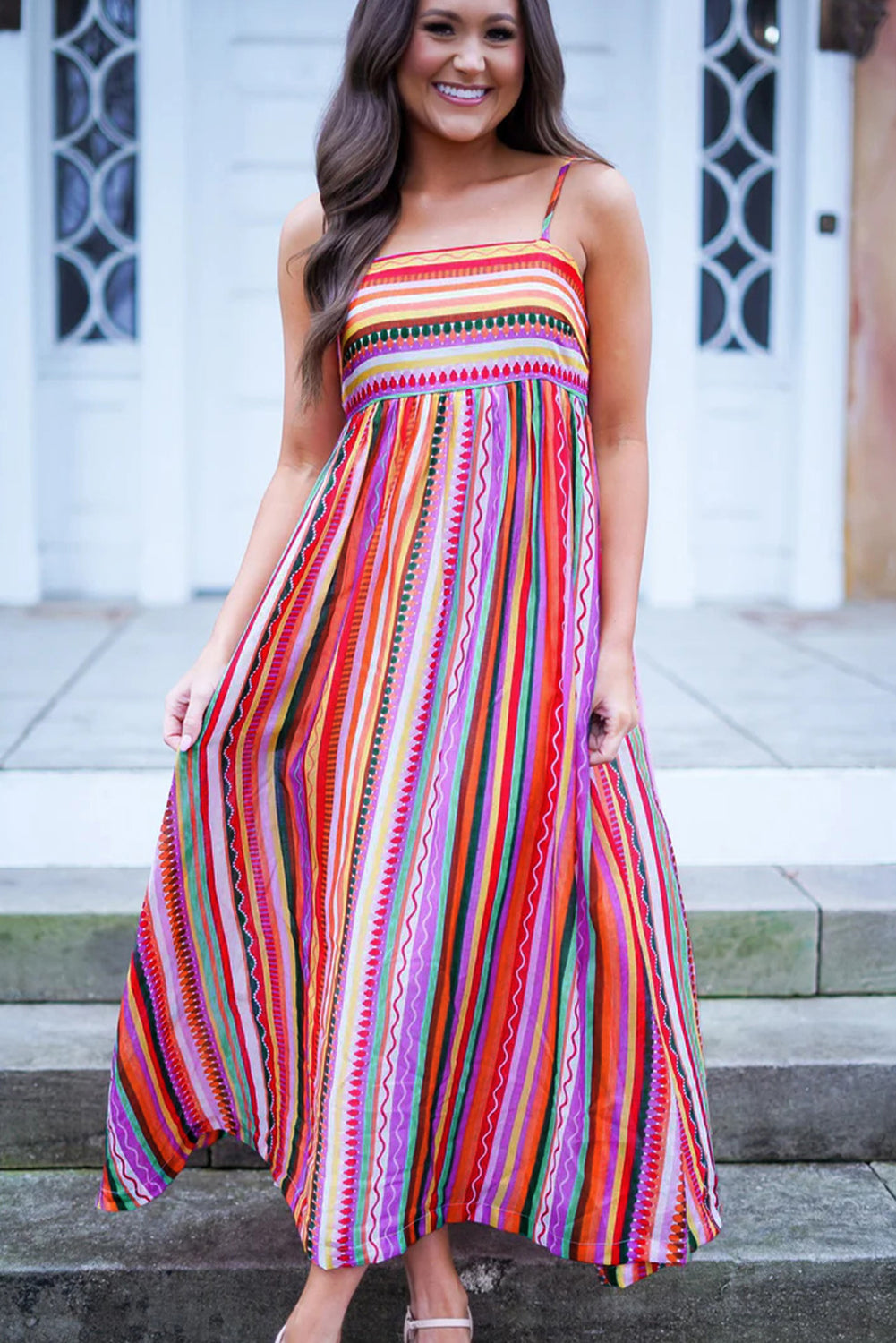 Multicolour Boho Striped Spaghetti Strap Smocked Back Maxi DressMaterial:100%Polyester

• Embrace a vibrant blend of colors in this maxi dress, perfect for daily wear with its relaxed, sleeveless design.
• The shirred back ensu