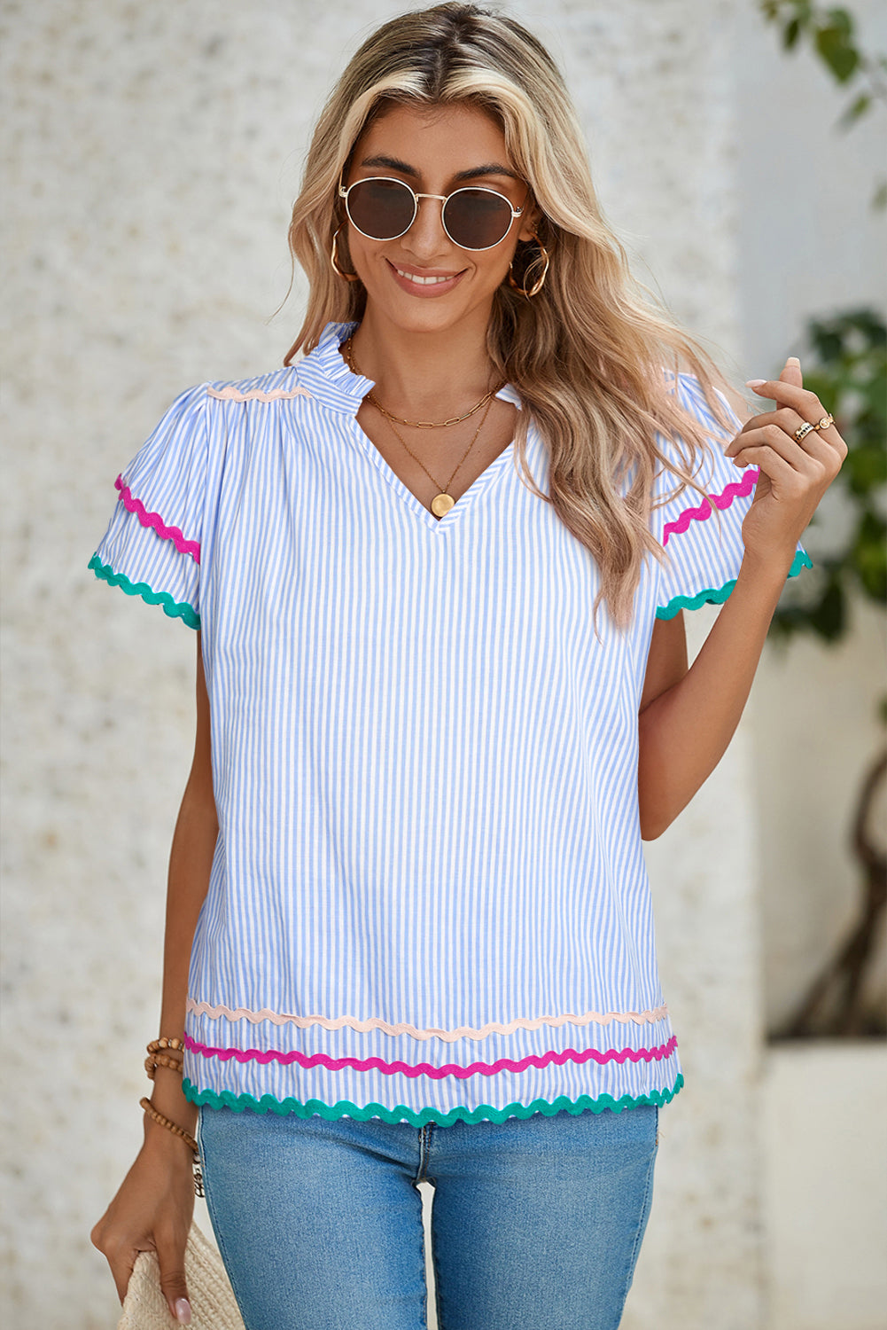Sky Blue Striped Ricrac Splicing Frill V-Neck BlouseMaterial:100%Cotton



		Playful stripes: This blouse features a fun striped pattern with flirty frill details and a flattering V-neck.
	
	
		Chic and charming: