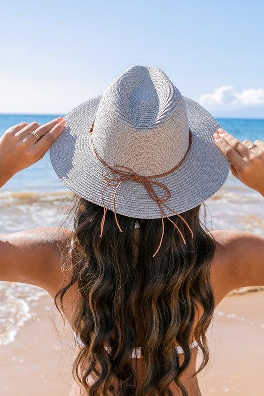 Beaded Belt Straw Panama Fedora HatBeaded Belt Straw Panama HatDetailsBeaded or Embroidered Belt AccentSuede TieMaterial: 100% strawBrim length: 3.25"
Style: Fedora hat
Embellishment: Bead or Embroide
