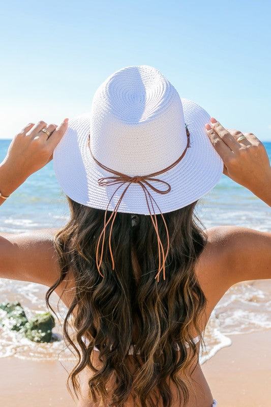 Beaded Belt Straw Panama Fedora HatBeaded Belt Straw Panama HatDetailsBeaded or Embroidered Belt AccentSuede TieMaterial: 100% strawBrim length: 3.25"
Style: Fedora hat
Embellishment: Bead or Embroide