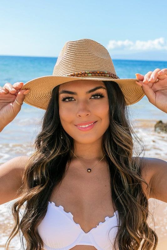 Beaded Belt Straw Panama Fedora HatBeaded Belt Straw Panama HatDetailsBeaded or Embroidered Belt AccentSuede TieMaterial: 100% strawBrim length: 3.25"
Style: Fedora hat
Embellishment: Bead or Embroide