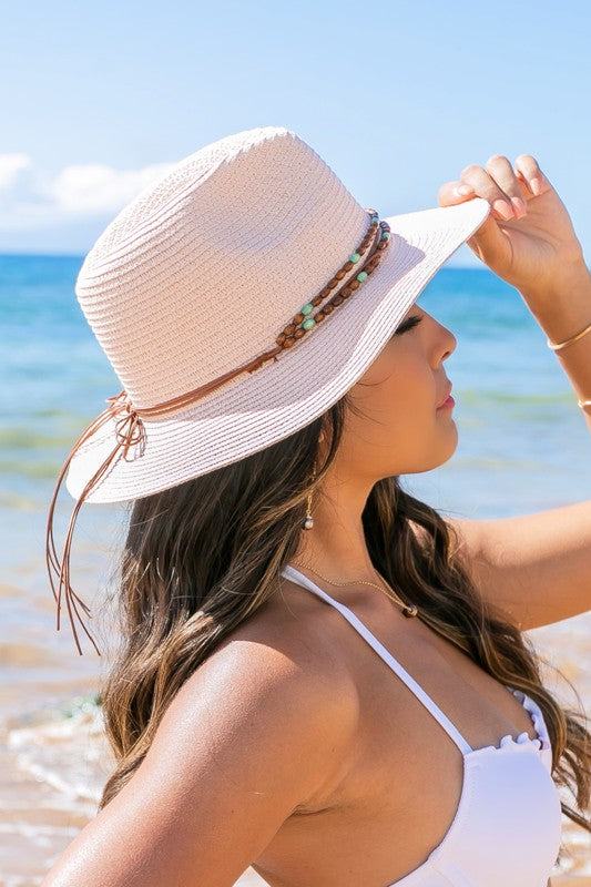 Beaded Belt Straw Panama Fedora HatBeaded Belt Straw Panama HatDetailsBeaded or Embroidered Belt AccentSuede TieMaterial: 100% strawBrim length: 3.25"
Style: Fedora hat
Embellishment: Bead or Embroide