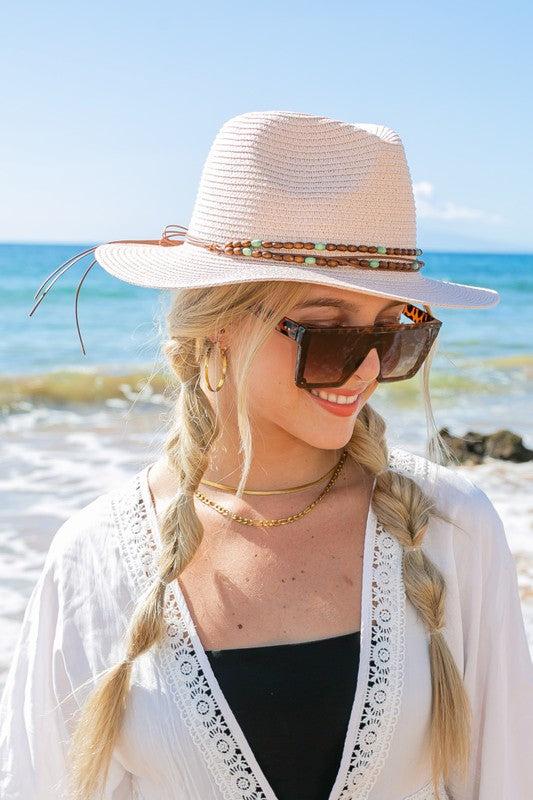 Beaded Belt Straw Panama Fedora HatBeaded Belt Straw Panama HatDetailsBeaded or Embroidered Belt AccentSuede TieMaterial: 100% strawBrim length: 3.25"
Style: Fedora hat
Embellishment: Bead or Embroide
