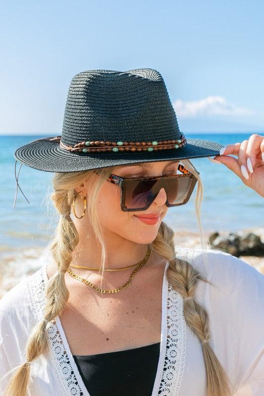 Beaded Belt Straw Panama Fedora HatBeaded Belt Straw Panama HatDetailsBeaded or Embroidered Belt AccentSuede TieMaterial: 100% strawBrim length: 3.25"
Style: Fedora hat
Embellishment: Bead or Embroide