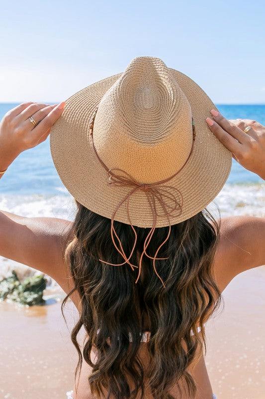 Beaded Belt Straw Panama Fedora HatBeaded Belt Straw Panama HatDetailsBeaded or Embroidered Belt AccentSuede TieMaterial: 100% strawBrim length: 3.25"
Style: Fedora hat
Embellishment: Bead or Embroide