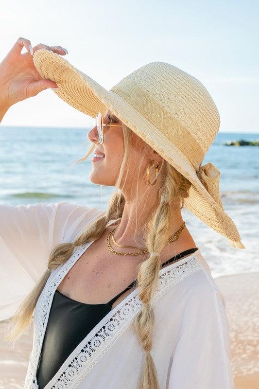 Scallop Edge Bow Accent SunhatScallop Edge Bow Accent Sunhat DetailsScallop edge designBurlap bow accentHat material: 100% strawBrim length: 5.5"Foldable &amp; packableInside lining for all-day c