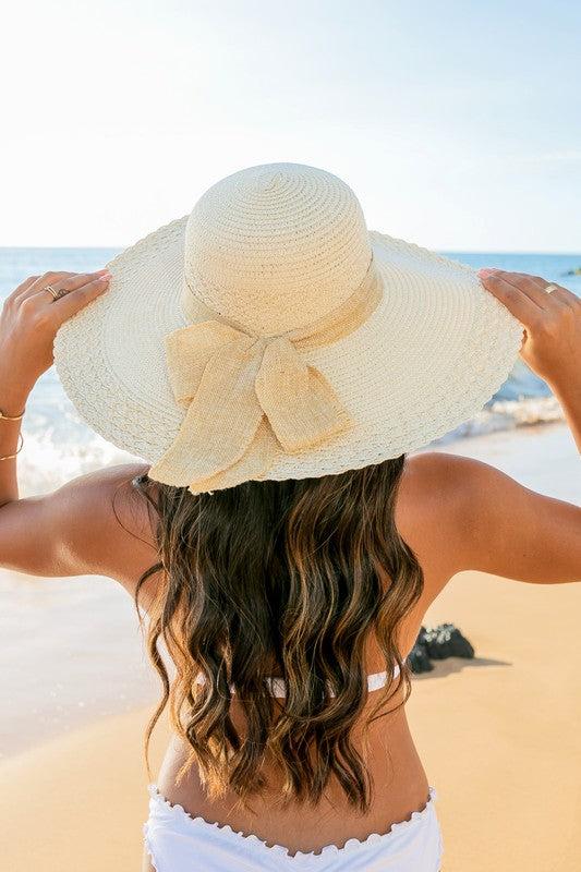 Scallop Edge Bow Accent SunhatScallop Edge Bow Accent Sunhat DetailsScallop edge designBurlap bow accentHat material: 100% strawBrim length: 5.5"Foldable &amp; packableInside lining for all-day c