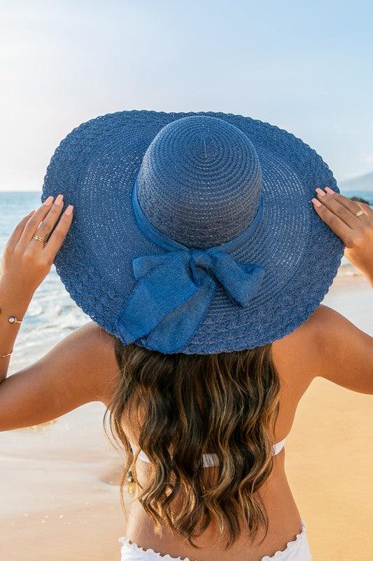 Scallop Edge Bow Accent SunhatScallop Edge Bow Accent Sunhat DetailsScallop edge designBurlap bow accentHat material: 100% strawBrim length: 5.5"Foldable &amp; packableInside lining for all-day c