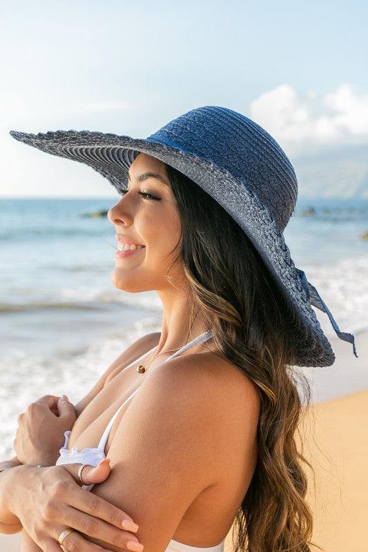 Scallop Edge Bow Accent SunhatScallop Edge Bow Accent Sunhat DetailsScallop edge designBurlap bow accentHat material: 100% strawBrim length: 5.5"Foldable &amp; packableInside lining for all-day c