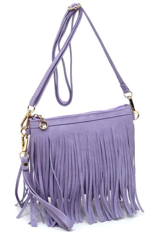 Western Fringe Clutch Cross Body BagWestern Fringe Clutch Cross Body BagFaux leatherZip top closureGold-tone hardwareDetachable shoulder strap &amp; wrist bandL 8.5 * H 6 * W 3