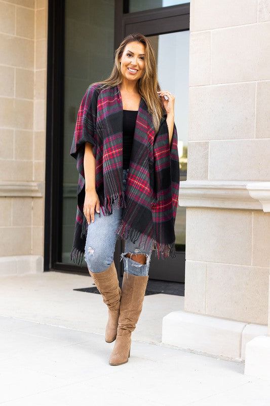 The Marlie One Size Shawl/PonchosIntroducing the one size shawl/poncho that will be the must-have accessory of this season! This beautiful, cheerful piece of apparel is crafted from super soft acryl