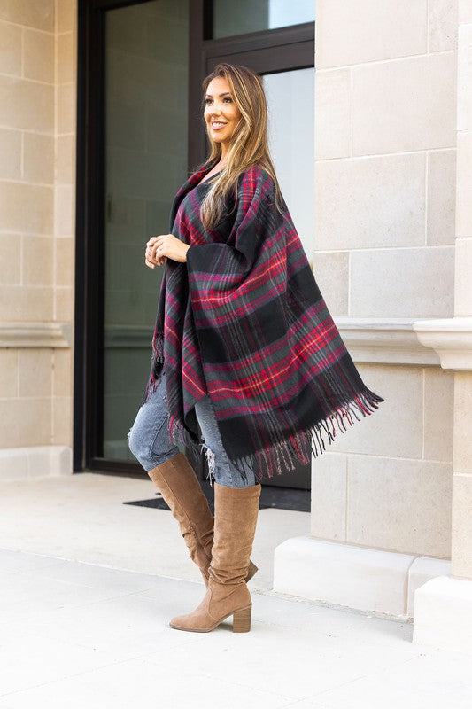 The Marlie One Size Shawl/PonchosIntroducing the one size shawl/poncho that will be the must-have accessory of this season! This beautiful, cheerful piece of apparel is crafted from super soft acryl