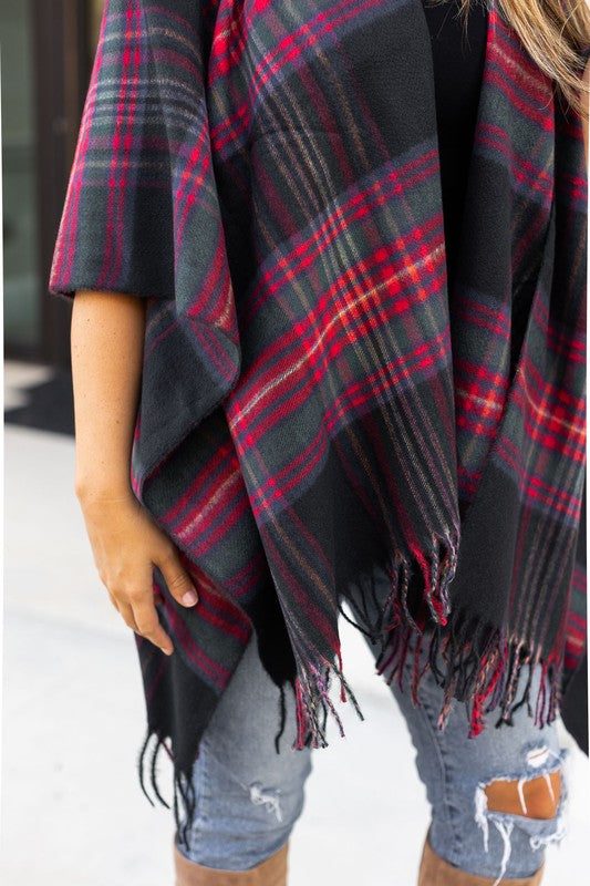 The Marlie One Size Shawl/PonchosIntroducing the one size shawl/poncho that will be the must-have accessory of this season! This beautiful, cheerful piece of apparel is crafted from super soft acryl