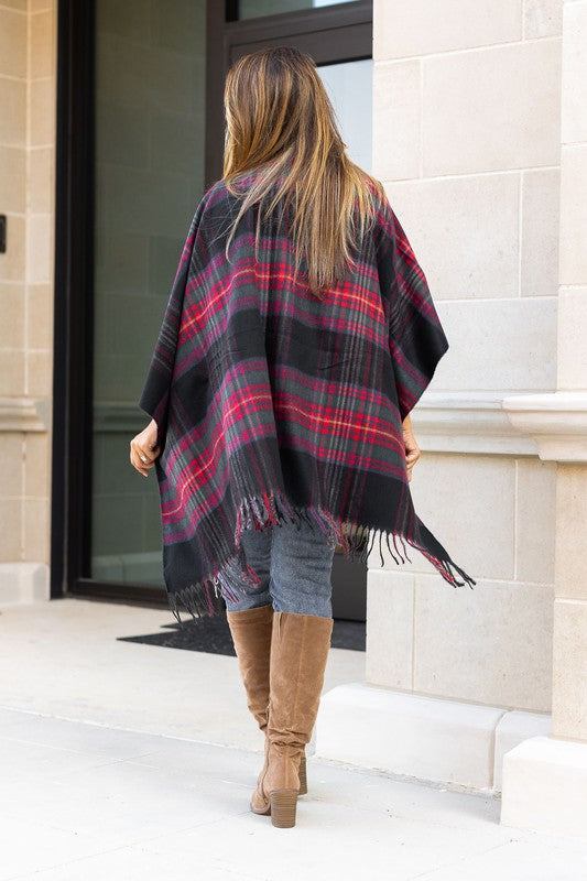 The Marlie One Size Shawl/PonchosIntroducing the one size shawl/poncho that will be the must-have accessory of this season! This beautiful, cheerful piece of apparel is crafted from super soft acryl
