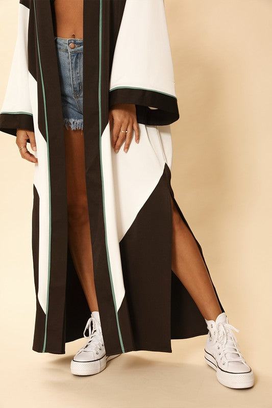 Chevron Kimono*Exclusive In-House Design*- Maxi kimono with chevron motif- Side slits- Textured satin fabric- Runs bigMade In: China