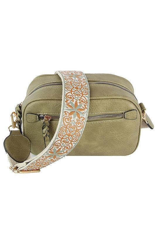 Fashion Guitar strap Crossbody BagFashion Guitar strap Crossbody Bag Faux vegan leather Zip top closure Gold-tone hardware Detachable shoulder strap L 8.5 * H 5.5 * W 3