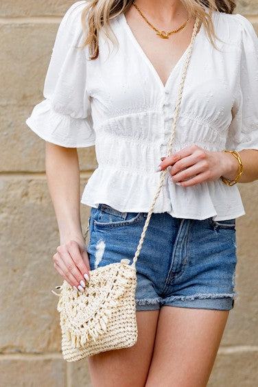 Sofia Foldover Straw Crossbody BagSofia Foldover Straw CrossbodyFold Over FlapHand Tied Rattan Edge DetailMeasurement: 6.5"x10"Woven Straw ExteriorLined Interior: 30% Cotton/70% PolyesterAttached Wov