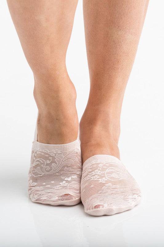 No Slip Floral Lace Sneaker Socks- 3 PackLightweight, no show, no slip socks give you the layer you need without adding any extra bulk.Sold in Packs of ThreeFloral Lace Design90% Acrylic/ 10% SpandexNo-slip