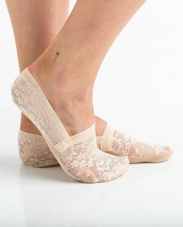 No Slip Floral Lace Sneaker Socks- 3 PackLightweight, no show, no slip socks give you the layer you need without adding any extra bulk.Sold in Packs of ThreeFloral Lace Design90% Acrylic/ 10% SpandexNo-slip