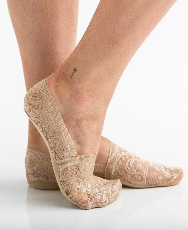 No Slip Floral Lace Sneaker Socks- 3 PackLightweight, no show, no slip socks give you the layer you need without adding any extra bulk.Sold in Packs of ThreeFloral Lace Design90% Acrylic/ 10% SpandexNo-slip