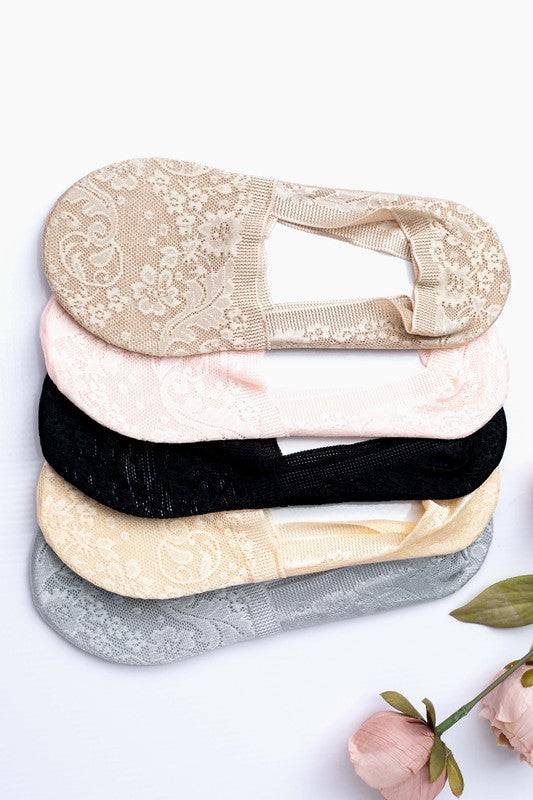 No Slip Floral Lace Sneaker Socks- 3 PackLightweight, no show, no slip socks give you the layer you need without adding any extra bulk.Sold in Packs of ThreeFloral Lace Design90% Acrylic/ 10% SpandexNo-slip