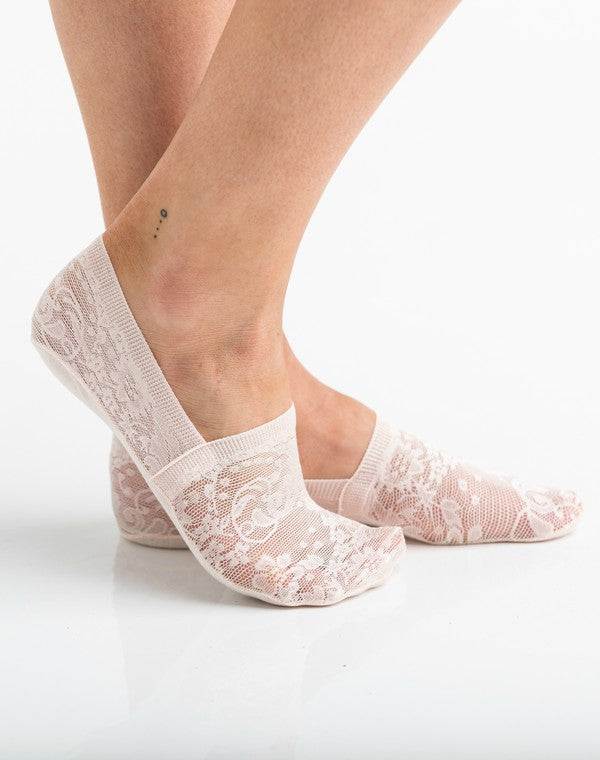 No Slip Floral Lace Sneaker Socks- 3 PackLightweight, no show, no slip socks give you the layer you need without adding any extra bulk.Sold in Packs of ThreeFloral Lace Design90% Acrylic/ 10% SpandexNo-slip