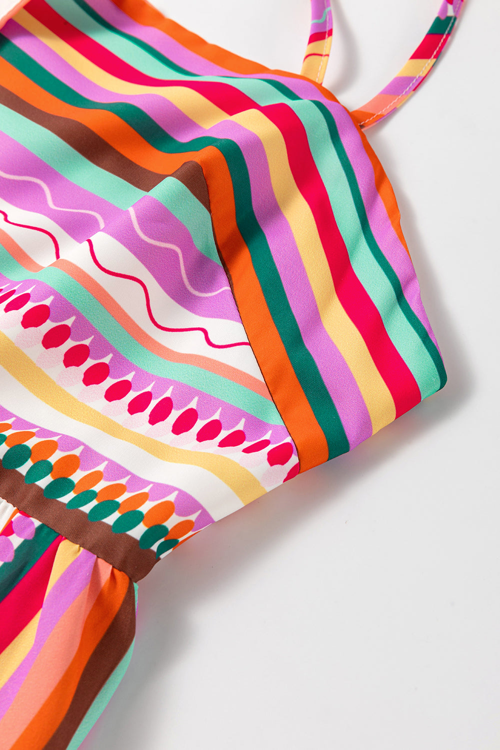 Multicolour Boho Striped Spaghetti Strap Smocked Back Maxi DressMaterial:100%Polyester

• Embrace a vibrant blend of colors in this maxi dress, perfect for daily wear with its relaxed, sleeveless design.
• The shirred back ensu