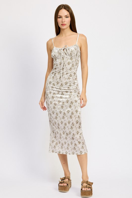 PRINTED SPAGHETTI STRAP MIDI DRESSSIZE &amp; FIT :MODEL WEARS SIZE SMALLMODEL'S HEIGHT 5'9Made In: IMPORTEDFabric Contents: 100% POLYESTERLINING: 100% POLYESTER