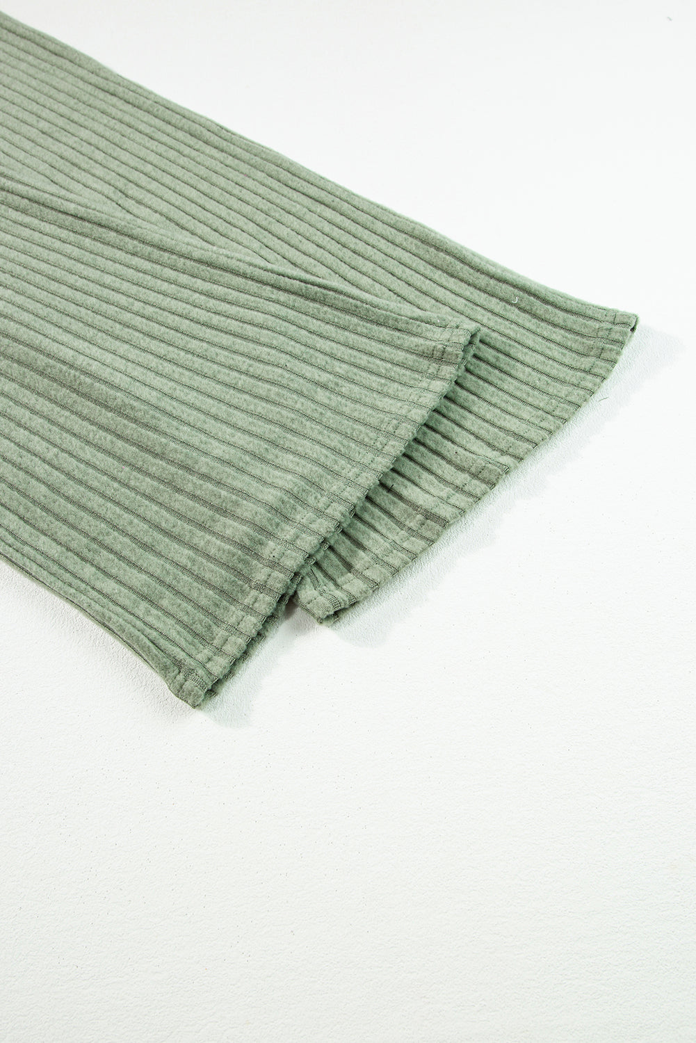 Grass Green Solid Color Ribbed Short Sleeve Wide Leg JumpsuitMaterial:85%Polyester+10%Viscose+5%Elastane



		The jumpsuit is a versatile and trendy one-piece outfit, featuring a solid color design that offers a sleek and mi