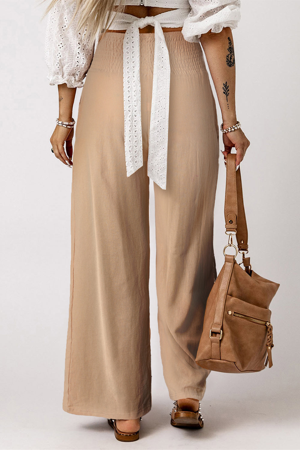Black Smocked Wide Waistband High Waist Wide Leg PantsMaterial:65%COTTON+35%POLYESTER



		Flattering smocked waistband cinches at the
waist for a lovely silhouette
	
	
		High waist design elongates legs for a
st