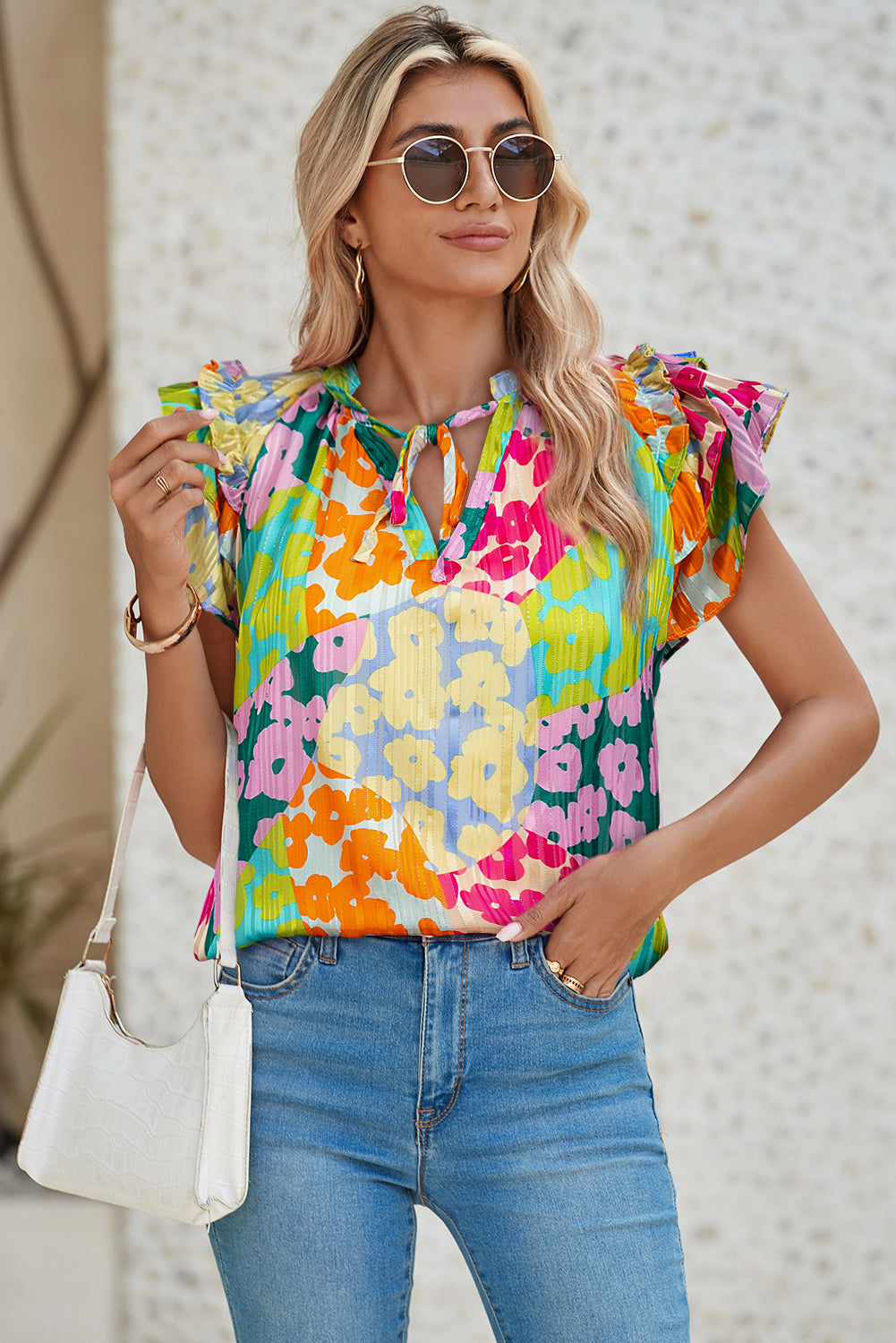 Multicolour Leopard Flutter Sleeve V Neck Crinkled BlouseMaterial:100%Polyester

• Stand out in style with this blouse, perfect for adding a touch of wild elegance to your wardrobe.
• The vibrant multicolored leopard pri