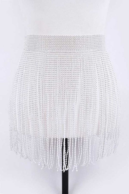 Rhinestone Slash Fringe BeltWidth - 13"Length - 41"One Size Fits MostRhinestone, IronLead &amp; Nickel Compliant.
