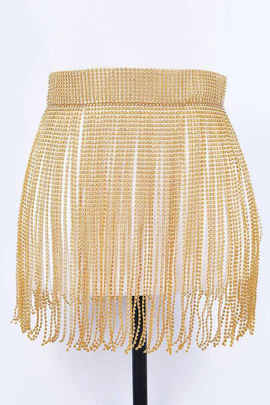 Rhinestone Slash Fringe BeltWidth - 13"Length - 41"One Size Fits MostRhinestone, IronLead &amp; Nickel Compliant.
