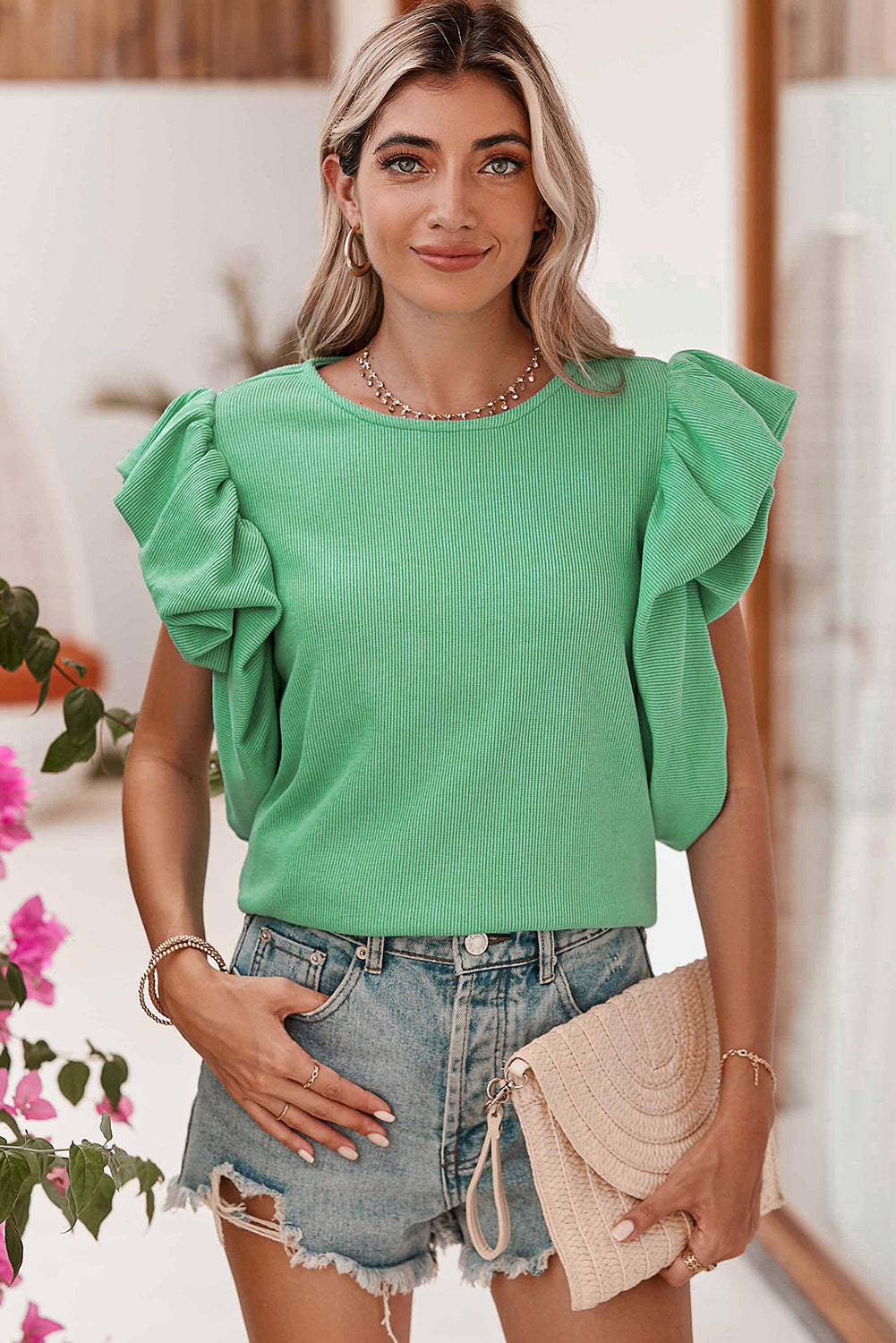 Green Solid Color Ruffle Sleeve Ribbed BlouseMaterial:65%cotton+33%polyester+2%Elastane



		The blouse features ruffle sleeves, which add a playful and romantic touch to the overall design. 
	
	
		The sol