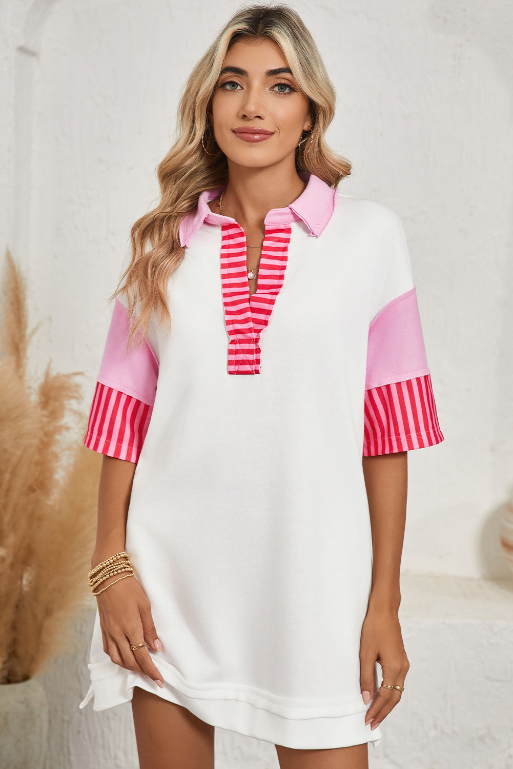 Pink Stripe Colorblock Sleeve Collared Mini DressMaterial:65%Polyester+35%Cotton

• The combination of pink and stripes adds a fun and trendy touch to your outfit.
• Embrace the relaxed vibes with the drop sleeve