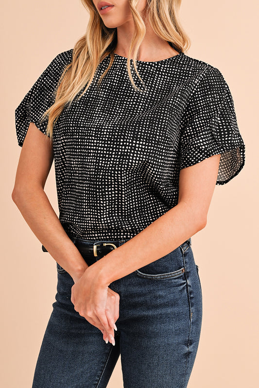 Black Dotted Puff Sleeve Round Neck BlouseMaterial:100%Polyester



		This blouse is designed with puff sleeves, which are characterized by their voluminous and gathered appearance.
	
	
		The blouse is 