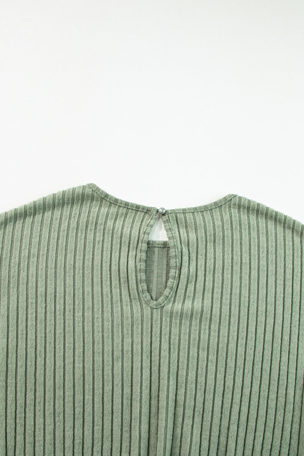 Grass Green Solid Color Ribbed Short Sleeve Wide Leg JumpsuitMaterial:85%Polyester+10%Viscose+5%Elastane



		The jumpsuit is a versatile and trendy one-piece outfit, featuring a solid color design that offers a sleek and mi