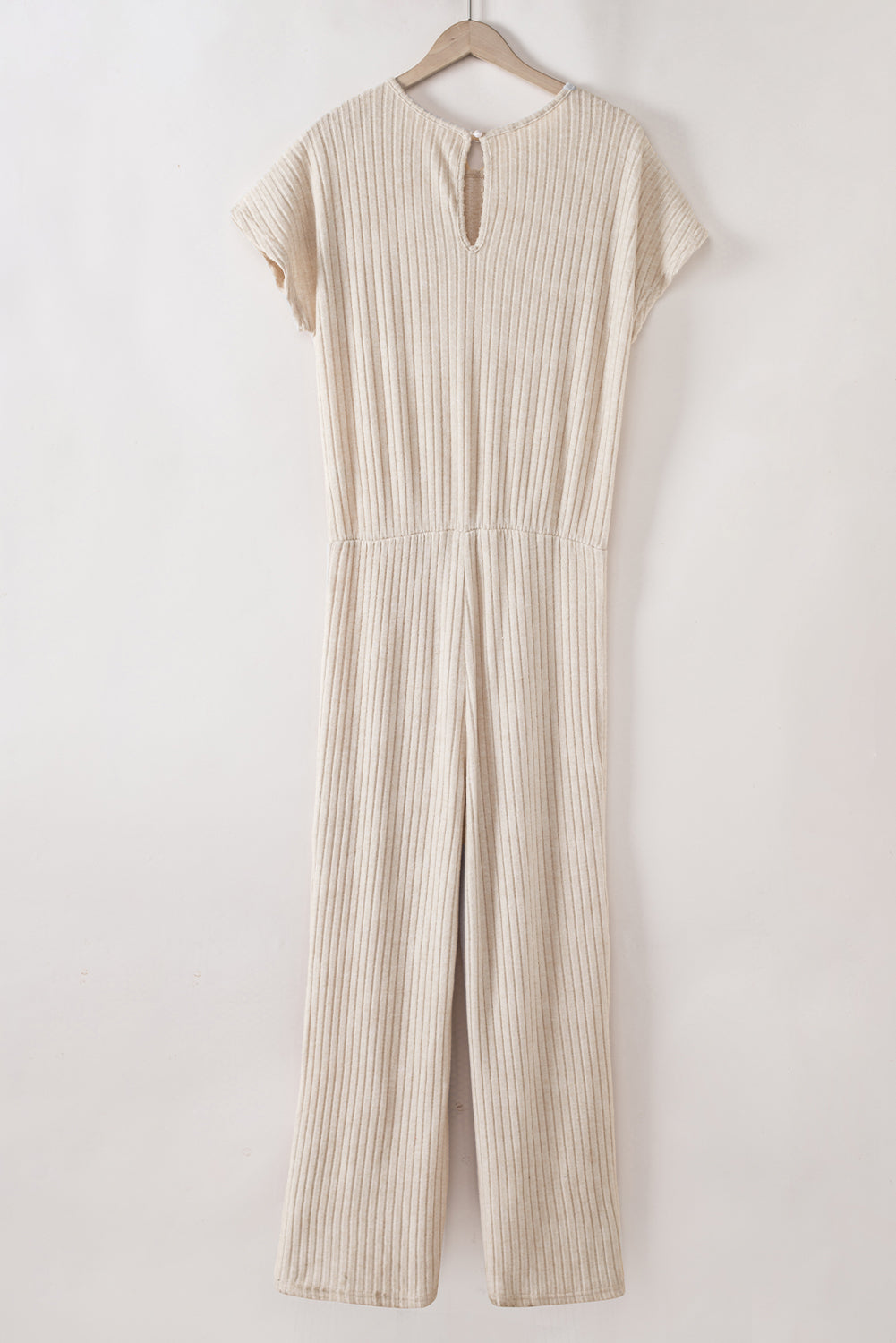 Grass Green Solid Color Ribbed Short Sleeve Wide Leg JumpsuitMaterial:85%Polyester+10%Viscose+5%Elastane



		The jumpsuit is a versatile and trendy one-piece outfit, featuring a solid color design that offers a sleek and mi