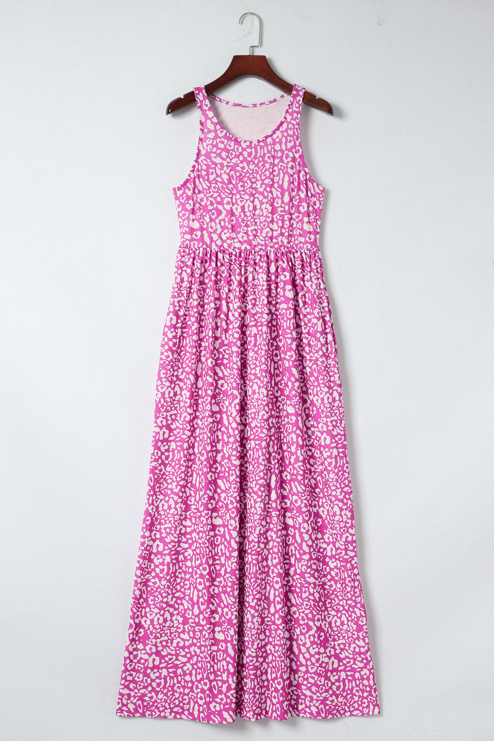 Pink Sleeveless Floor Length Leopard Print Dress with PocketsMaterial:95%POLYESTER+5%ELASTANE



		•The dress features a bold and eye-catching leopard print design.
	
	
		•The floor length and sleeveless design make it pe