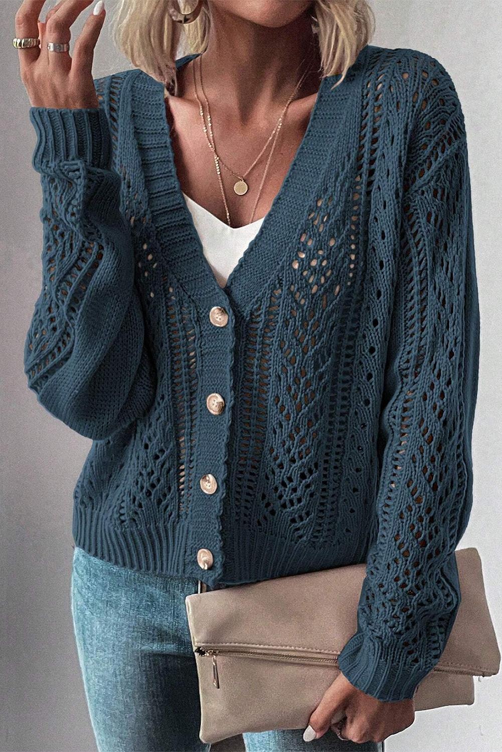 Real Teal Hollow Knit Drop Shoulder CardiganMaterial:60%Cotton+40%Acrylic

• Elevate your casual wardrobe with the cardigan, crafted for comfort and style, ideal for layering during transitional seasons.
• T