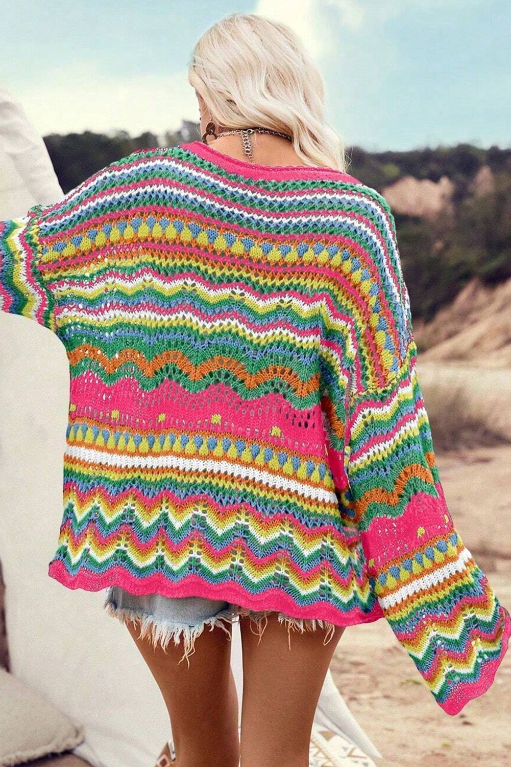 Rose Red Colorblock Striped Hollowed Knit Loose SweaterMaterial:55%Acrylic+45%Cotton

• Stay cozy and stylish in this sweater featuring a unique hollowed knit design for a trendy boho look.
• The loose fit of this swea