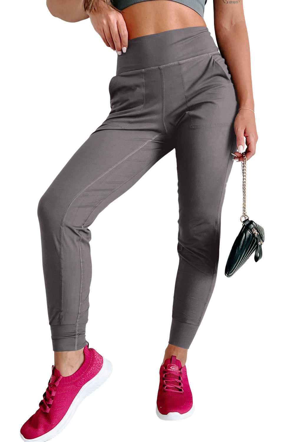 Black Exposed Seam High Waist Pocketed JoggersMaterial:100%Polyester



		These solid joggers are a versatile addition to your wardrobe, suitable for individuals of all body types.

	
		The exposed seam desi